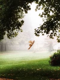 Man playing in water