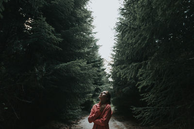 Full length of woman in forest