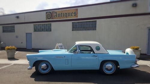 Vintage car on road in city