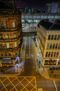 High angle view of illuminated city at night