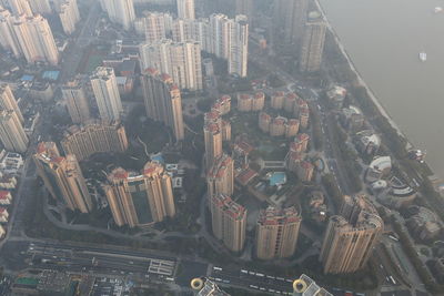 High angle view of modern buildings in city