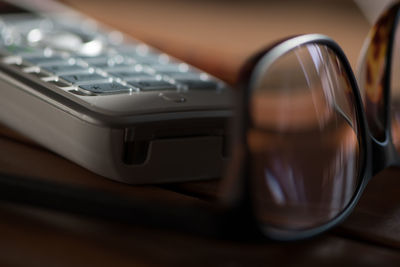 Close-up of camera on table