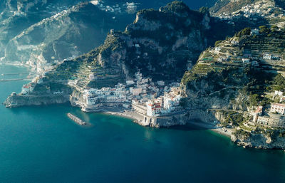 High angle view of sea and buildings