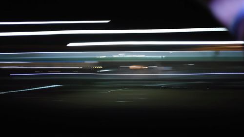 Light trails on road at night