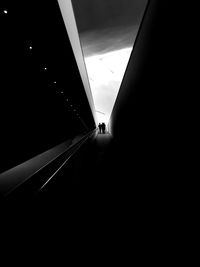 Low angle view of illuminated tunnel