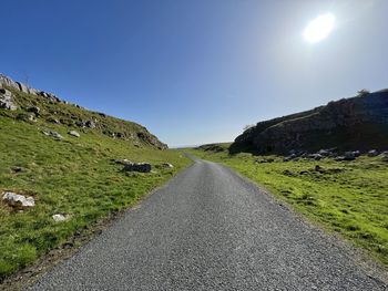 Road from settle crossing the moors, leading to malham, on a late sunny afternoon