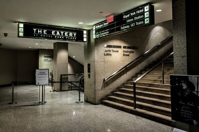 Information sign on illuminated entrance