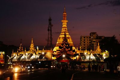 Illuminated buildings in city at night