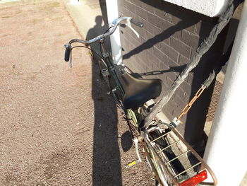 High angle view of bicycle on shadow