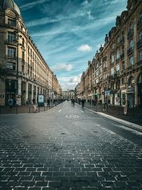 Canal amidst buildings in city