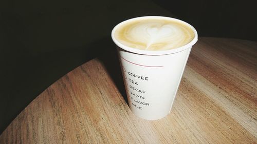 Close-up of coffee cup on table