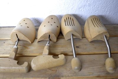 High angle view of kitchen utensils on wooden table