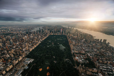 High angle view of city during sunset