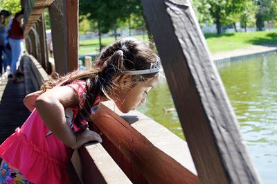 Close-up of woman with horse in water