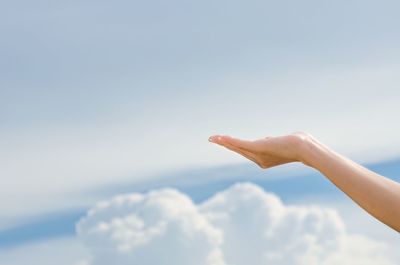 Midsection of person against sky