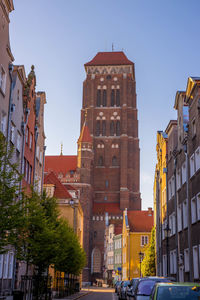 Low angle view of buildings against sky in city