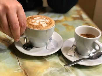 Close-up of coffee cup on table