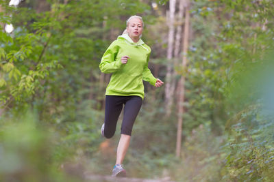 Full length of woman running in park