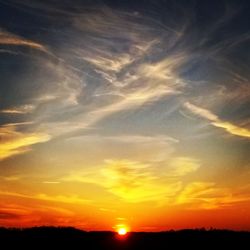 Scenic view of dramatic sky during sunset