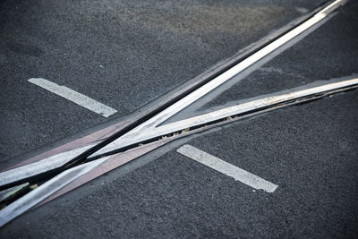 High angle view of arrow symbol on road