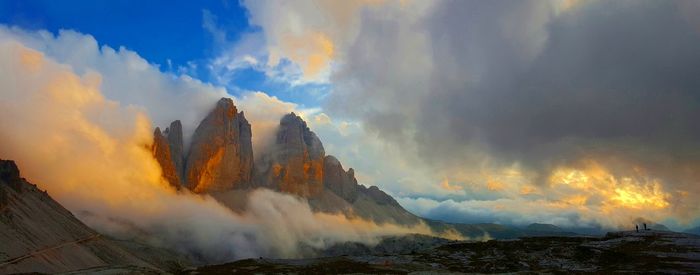 Panoramic view of mountains against sky during sunset