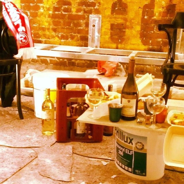 indoors, text, communication, food and drink, still life, western script, table, no people, technology, chair, absence, day, restaurant, old-fashioned, close-up, high angle view, container, non-western script, retail, retro styled