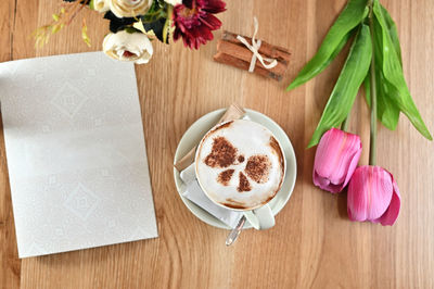 High angle view of coffee cup on table