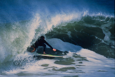 Man surfing in sea