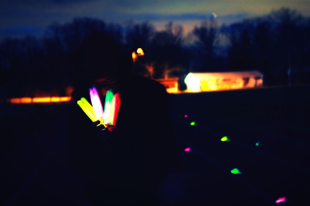 CLOSE-UP OF ILLUMINATED MULTI COLORED LIGHTS