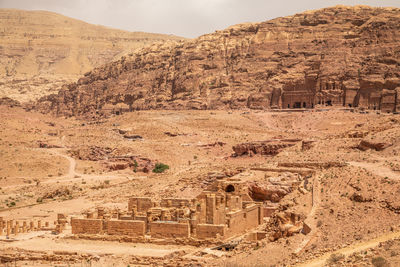 Ancient tomb of roman soldier and funeral ballroom carved in sandstone rock, petra, jordan