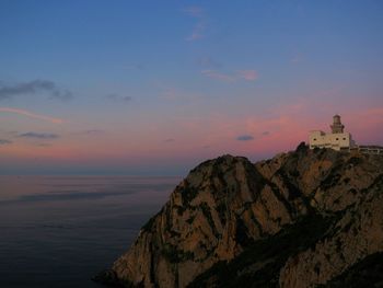 Scenic view of mountain against sky during sunset