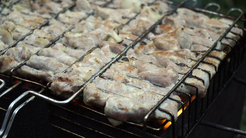 Barbecue with delicious grilled meat on the grill.barbecue meat is fried grill grate.