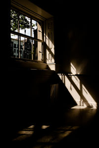 Sunlight streaming through window of house