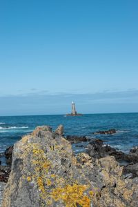 Scenic view of sea against clear sky