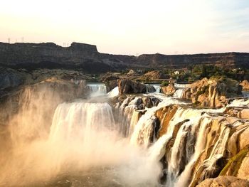 View of waterfall against sky