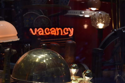 Close-up of illuminated lamp on table at store