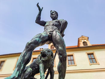 Low angle view of statue against sky