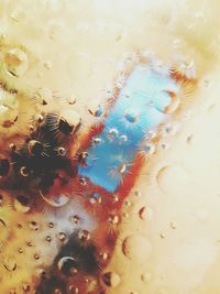 Close-up of water drops on glass