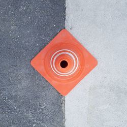 Close-up high angle view of traffic cone