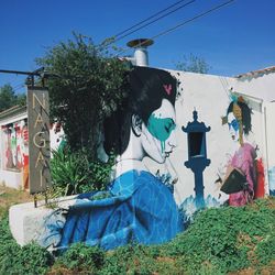 Low angle view of built structure against blue sky