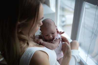 Mother and daughter at home