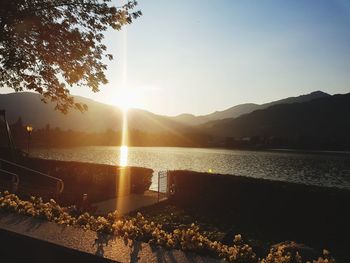 Scenic view of lake against sky during sunset