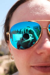 Close-up of woman wearing sunglasses