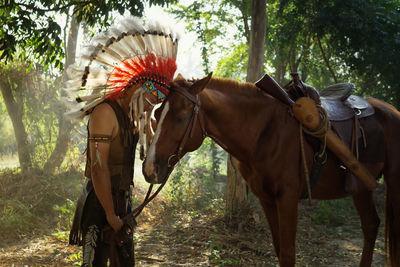 Horses standing in ranch