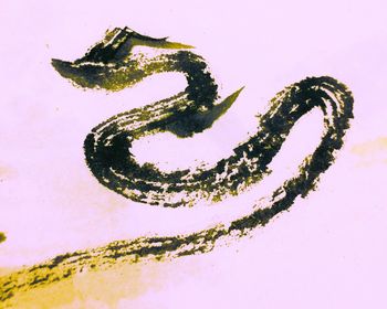 Close-up of water over white background