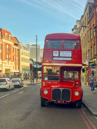 Red car on city street