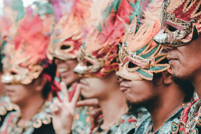 Young man dancing in traditional clothing