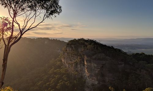 Scenic view of mountains against sky during sunset