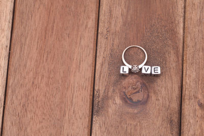 Close-up of text on wooden door