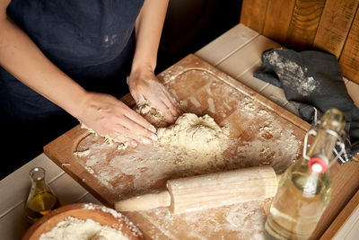 Midsection of woman preparing food